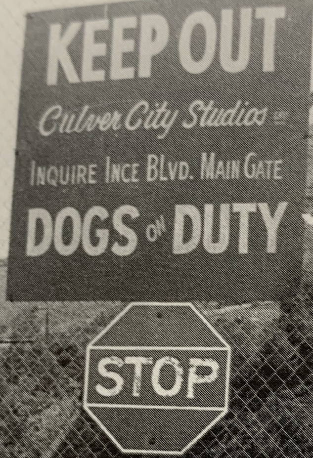 Culver Studios sign that says Keep Out Culver City Studios Inquire Ince Blvd. Main Gate Dogs on Duty Stop