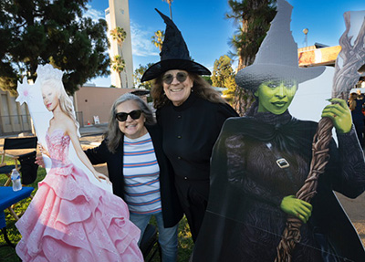 Michael and Hope with Wicked Character Cutouts