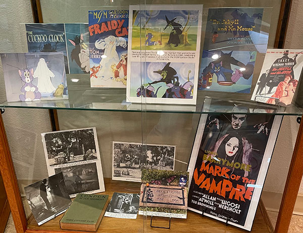 CCHS Exhibit October 2025 Spooky Themed History Cabinet Close Up of two shelves