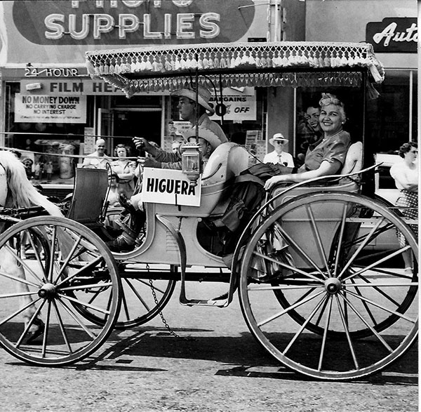 Historic photo of Two Ladies Riding in a Horse Drawn Cart