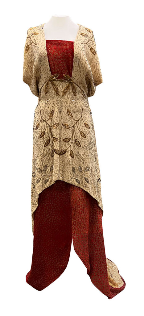 Unknown MGM dress costumer in gold and red, front view