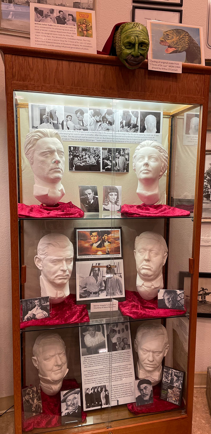 Picture of the Fall 2026 exhibit display case with various masks.